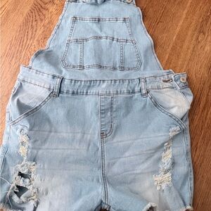 Light Blue Denim Overalls with Distressed Details